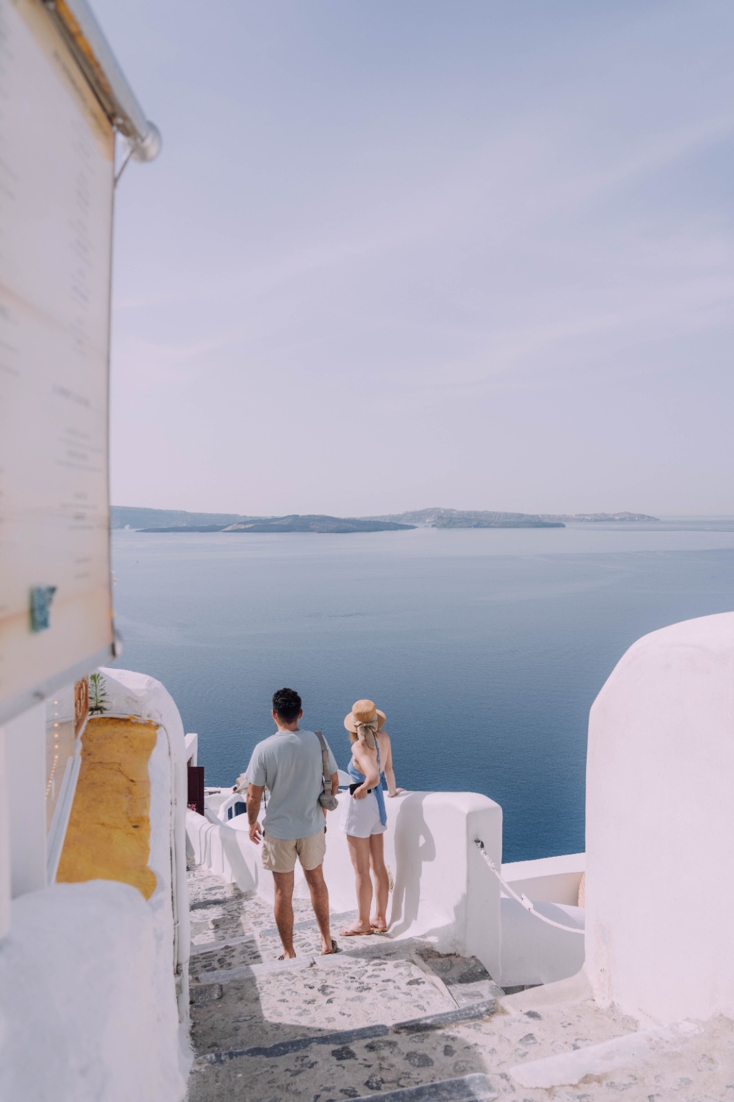 Couple enjoying a whitewashed Mediterranean village